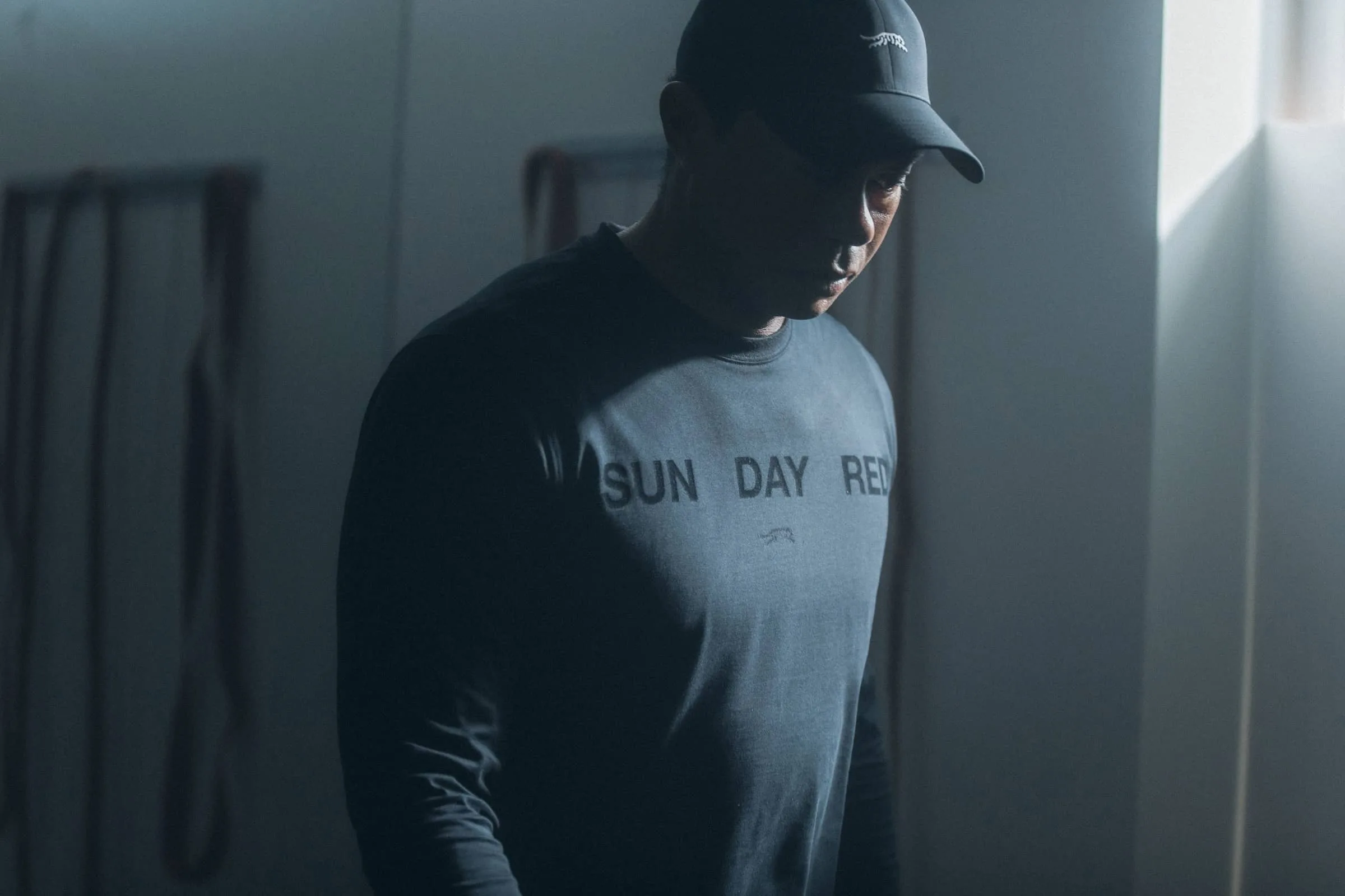 Tiger Woods wearing Sun Day Red Sweatshirt