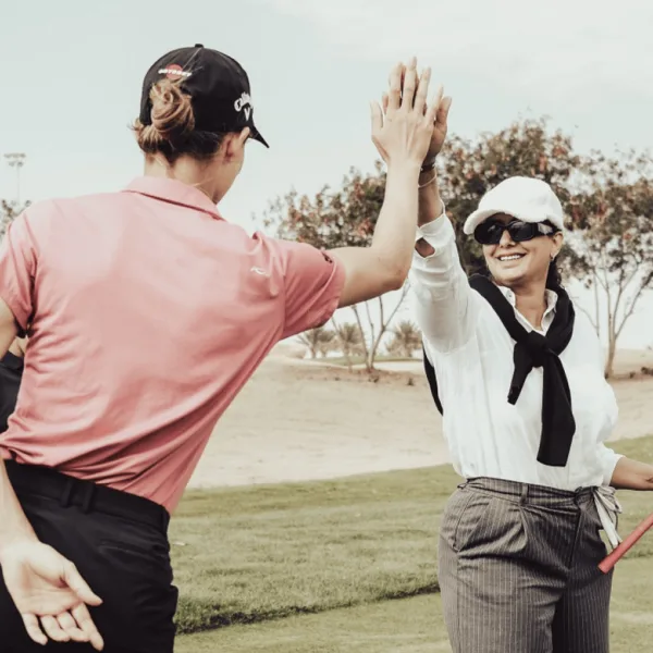 Aramco Female Golfers High Five