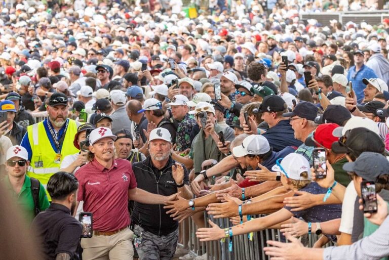 Captain Cameron Smith of Ripper GC celebrates with the crowd