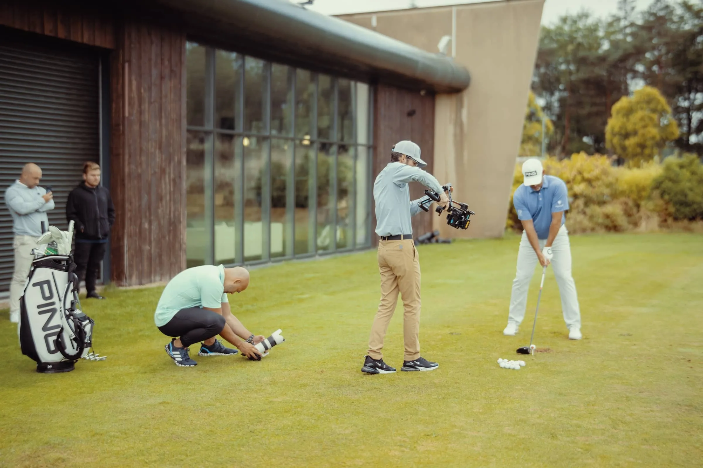 Lee Westwood being filmed lining up a shot