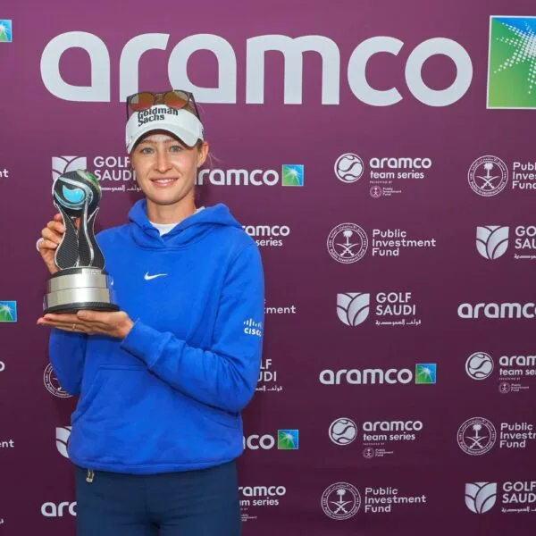 Nelly-Korda-with-Aramco-trophy