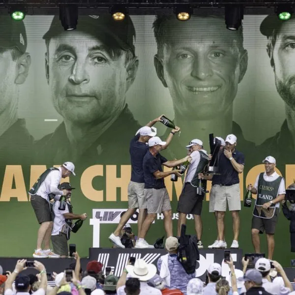 Team Champions Captain Martin Kaymer, Richard Bland, Adrian Meronk and Kalle Samooja of Cleeks GC and caddies Craig Connelly, James Walton, Stuart Beck and John Dempster celebrate onstage
