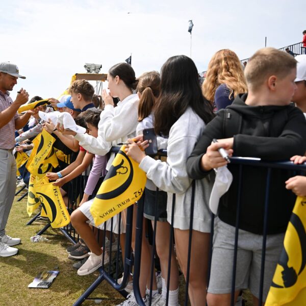 Bryson DeChambeau signs autographs for fans