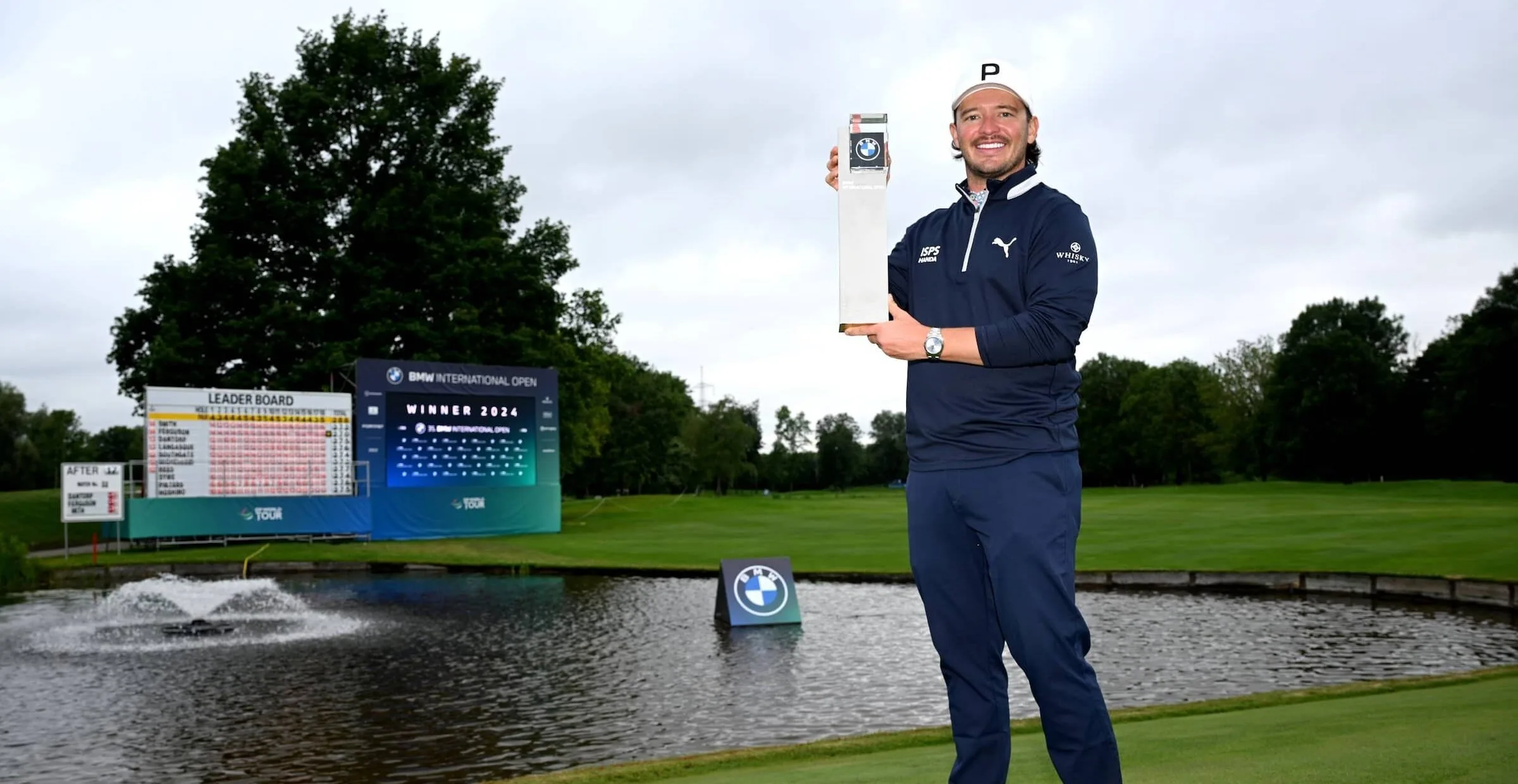 Ewen Ferguson with the BMW International Open Trophy