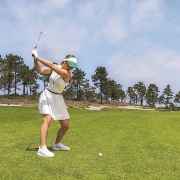 Golfer Wearing ECCO GOLF STREET 720 Shoes about to hit the ball