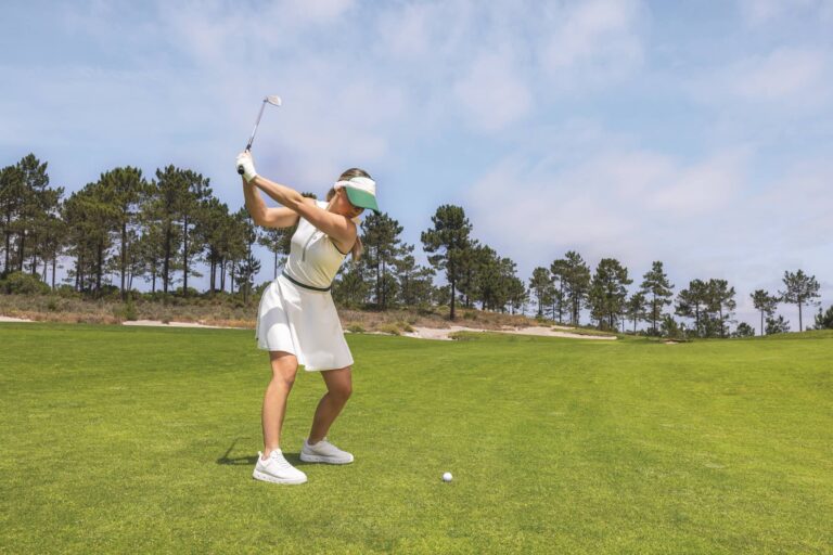 Golfer Wearing ECCO GOLF STREET 720 Shoes about to hit the ball