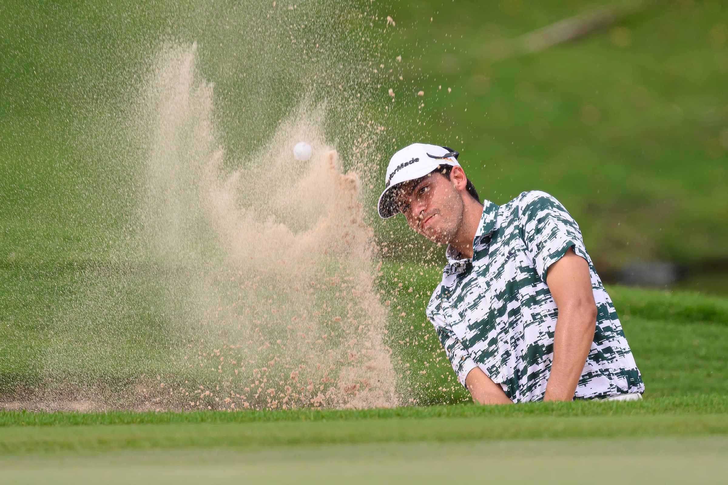 Mexico's Santiago De la Fuente of Mexico plays out of the sand on day two of the Black Mountain Championship