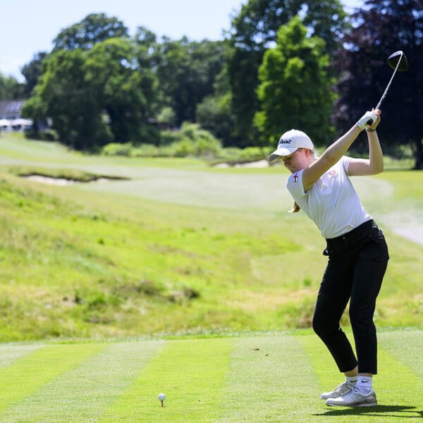 Young Golfer about to strike the ball