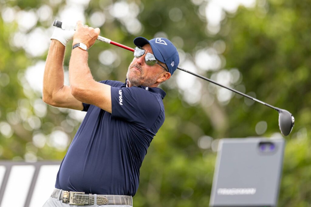 Captain Phil Mickelson of HyFlyers GC hits his shot from the 11th tee during the first round of LIV Golf Miami at Trump National Doral