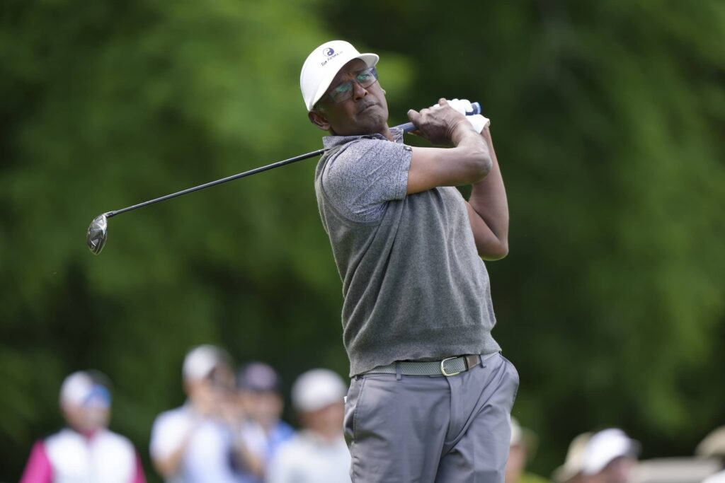 Vijay Singh hits his tee shot on the sixth hole during the third round of the Senior PGA Championship at Congressional Country Club
