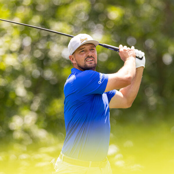 Captain Bryson DeChambeau of Crushers GC hits his shot from the fifth tee during the first round of LIV Golf Virginia
