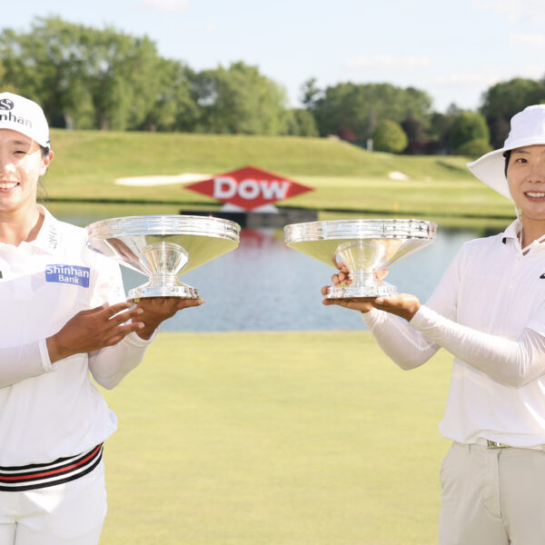 Jin Hee Im and Somi Lee of South Korea pose with their trophies after the final round of the Dow Championship 2025 at Midland Country