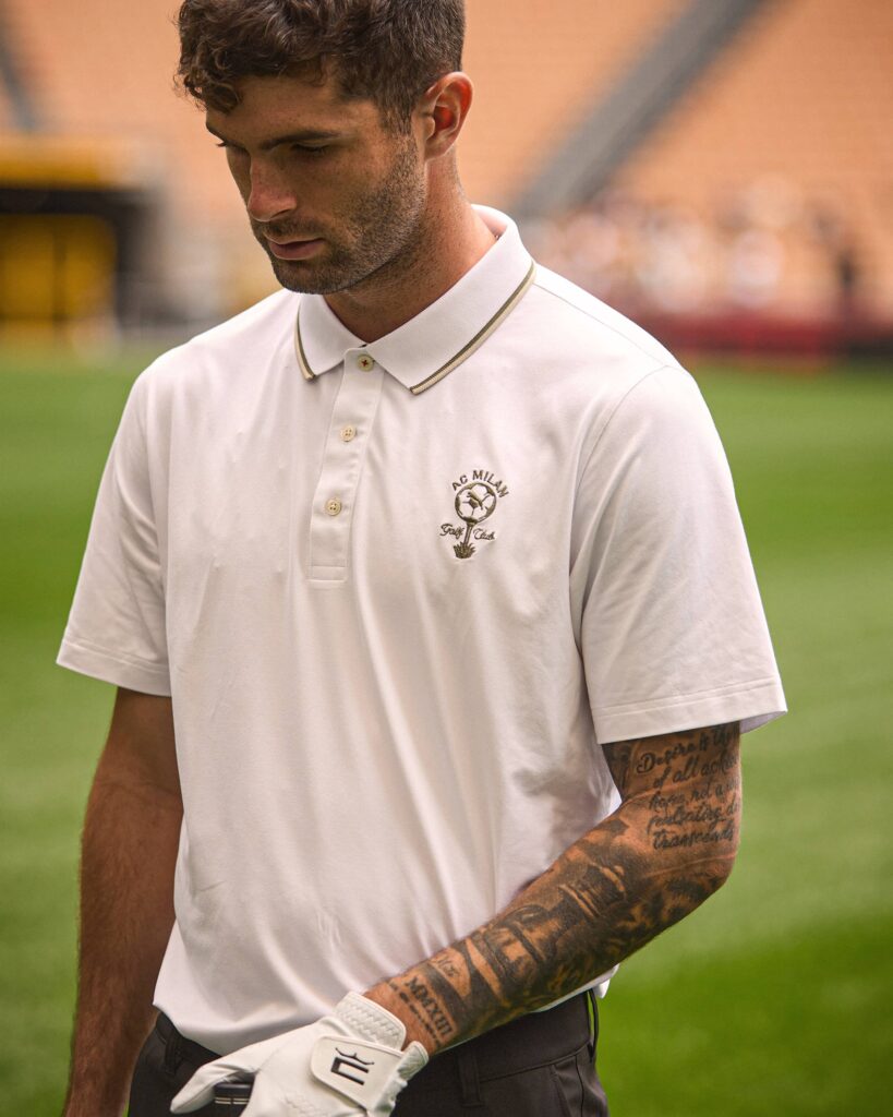 Christian Pulisic wearing the latest PUMA AC Milan Golf Polo Top