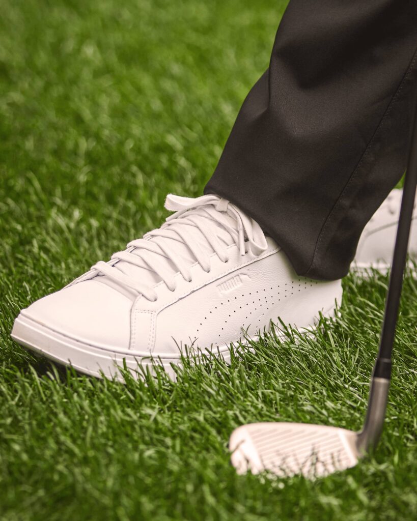 Christian Pulisic wearing the latest PUMA AC Milan Golf Shoe