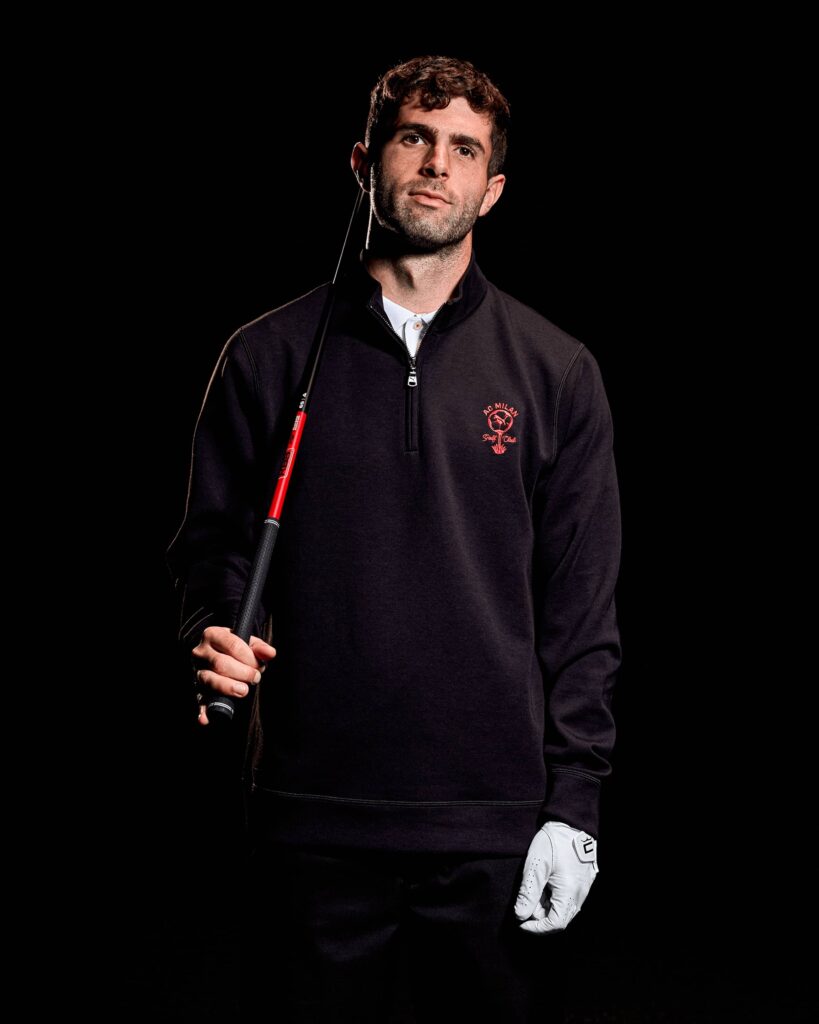 Christian Pulisic wearing the latest PUMA AC Milan Golf Sweatshirt
