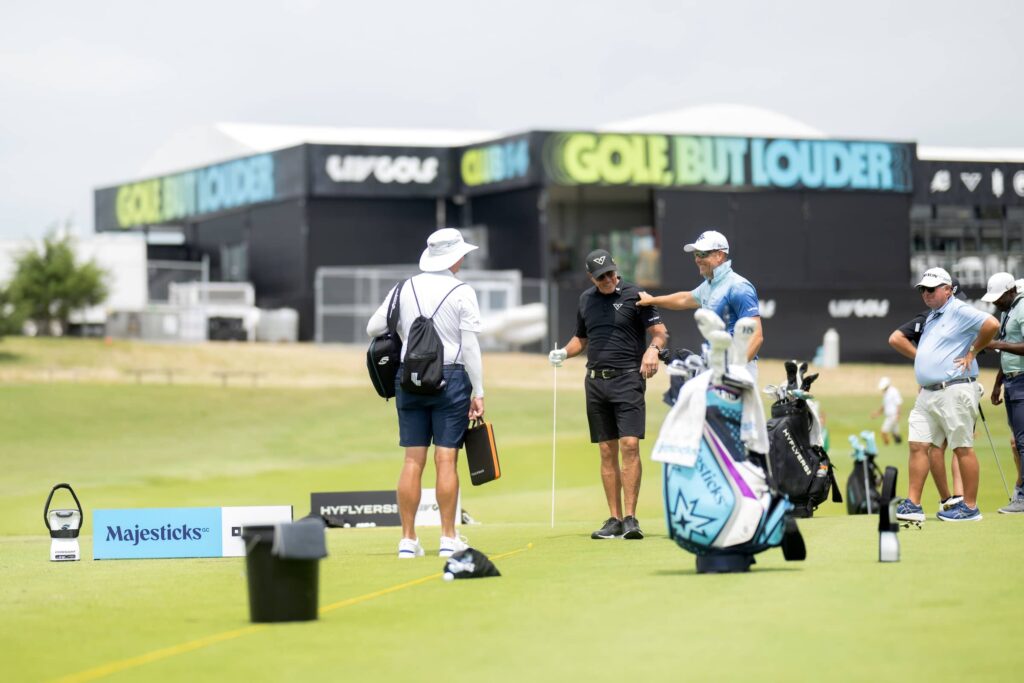 Henrik Stenson shares a joke with Phil Mickleson