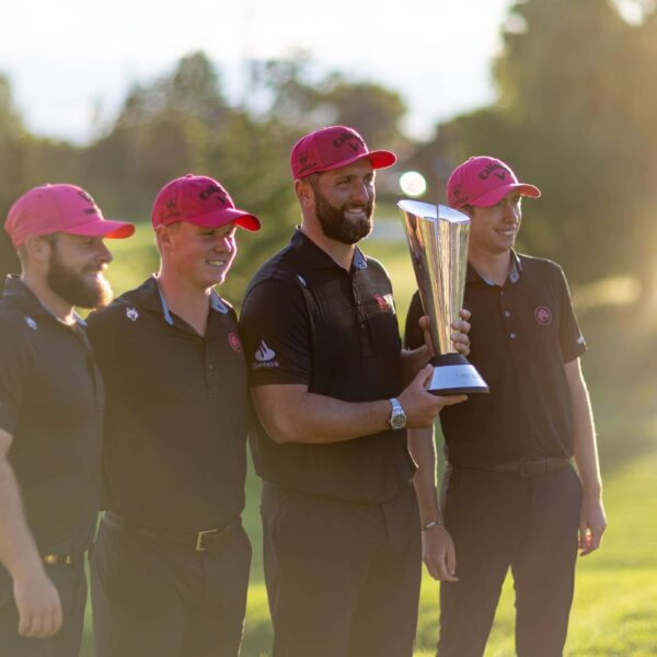 Team Champions Captain Jon Rahm, Tyrrell Hatton, Caleb Surratt and Tom McKibbin of Legion XIII pose with the trophy following the final round of LIV Golf Team Championship Michigan at The Cardinal at Saint John’s