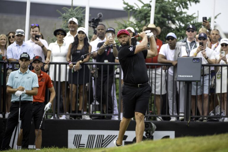 Captain Jon Rahm of Legion XIII hits his shot from the first tee during the final round of LIV Golf Indianapolis