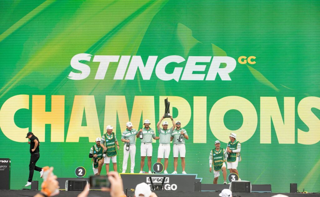 First place team champions, Charl Schwartzel, Branden Grace, Louis Oosthuizen, and Dean Burmester of Stinger GC celebrate with the trophy onstage following the final round of LIV Golf Chicago