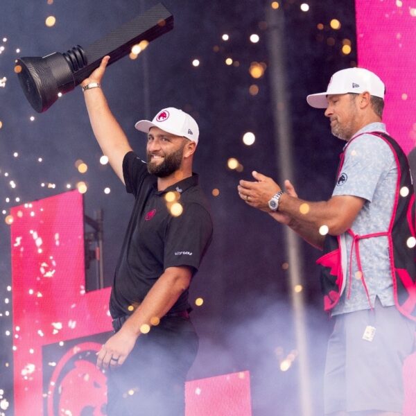 Jon Rahm lifts the Chicago trophy
