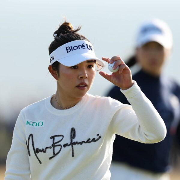 Miyu Yamashita of Japan acknowledges the crowd on the 18th green during the third round of the AIG Women's Open 2025 at Royal Porthcawl Golf Club