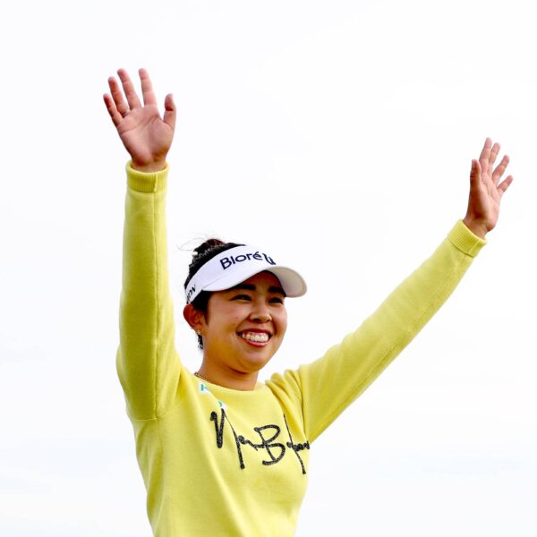 Miyu Yamashita of Japan acknowledges the crowd on the 18th green, during the trophy presentation, following the final round of the AIG Women's Open 2025