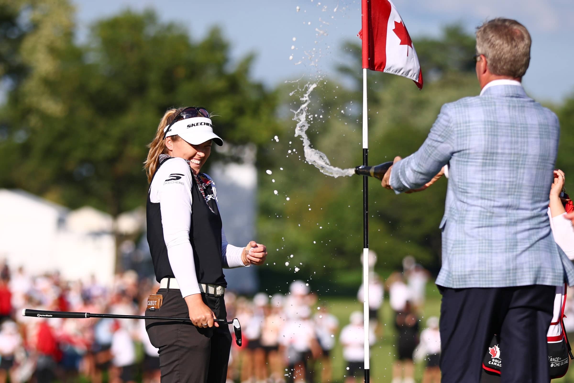 Brooke Henderson celebrating her CPKC Women's Open victory