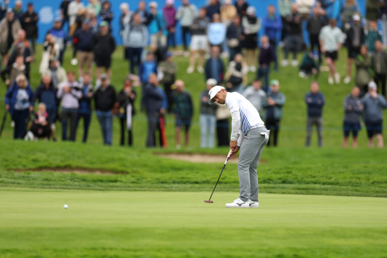 Adrien Saddier of France putts on the 18th green on day three of the Amgen Irish Open 2025