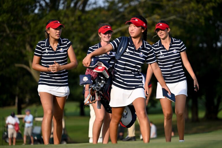 Lily Peng, Anna Fang, Zoe Cusack, and Asterisk Talley of Team United States walk off the course after the second round of the 2025 Junior Ryder Cup at Nassau Country Club