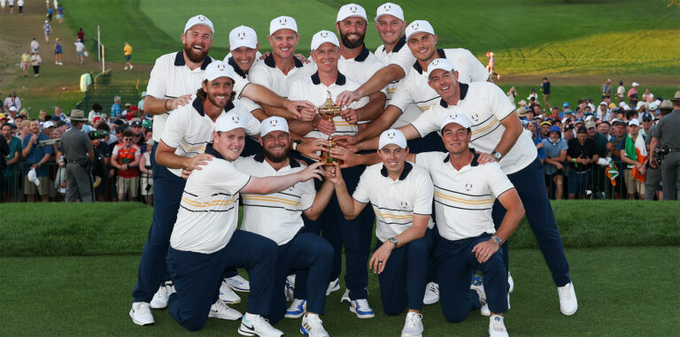 Shane Lowry, Tommy Fleetwood, Robert MacIntyre, Rasmus Hojgaard, Tyrrell Hatton, Justin Rose, Captain Luke Donald, Jon Rahm, Sepp Straka, Matt Fitzpatrick, Ludvig Aberg, Rory McIlroy, and Viktor Hovland of Team Europe pose with the Ryder Cup after winning the 2025 Ryder Cup on the Black Course at Bethpage State Park