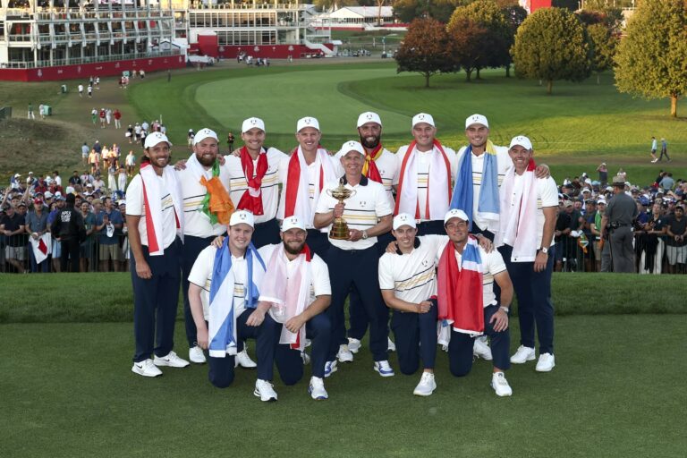 Team Europe pose with the Ryder Cup after winning the 2025 Ryder Cup