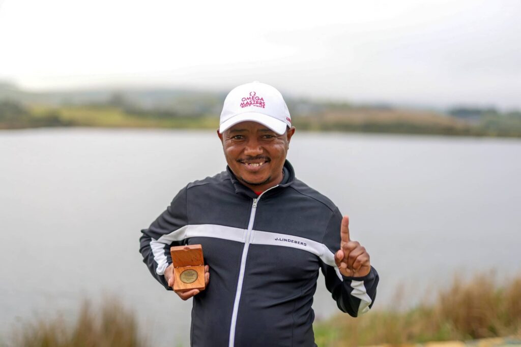 Albert Mciteka with his medallion