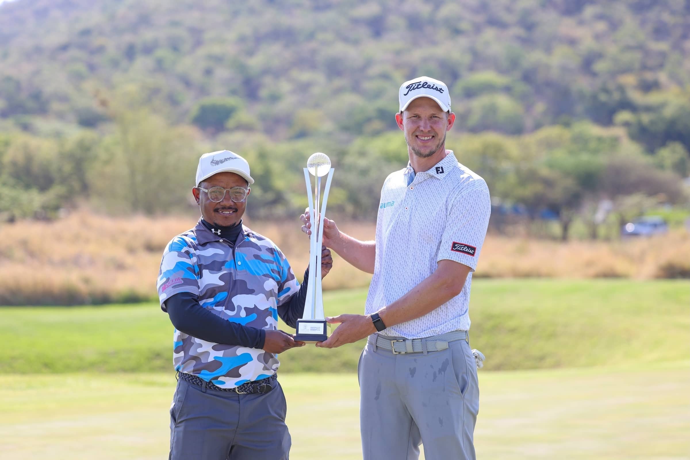 Pieter Moolman (right) and his caddie, Albert Mciteka
