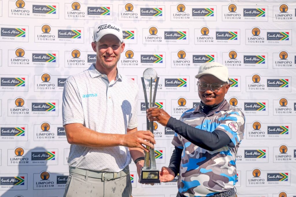 Pieter Moolman (right) with his caddie, Albert Mciteka