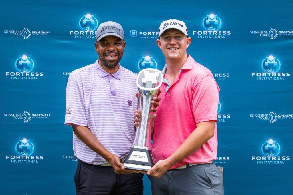 Warwick Purchase with his caddie Charley Msiza