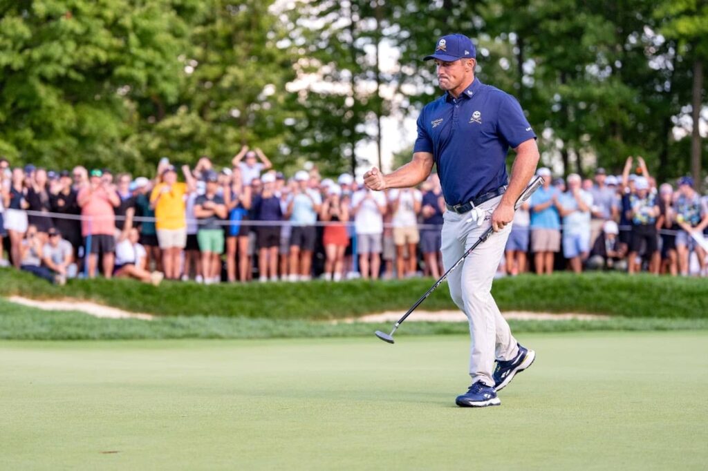 Captain Bryson DeChambeau of Crushers GC celebrates his putt during the playoff of final round of LIV Golf Team Championship Michigan at The Cardinal at Saint John’s Resort