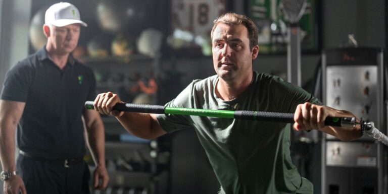 Scottie Scheffler warms up with GolfSwing Stick