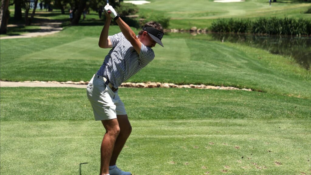 Jack Buchanan of South Africa tees off