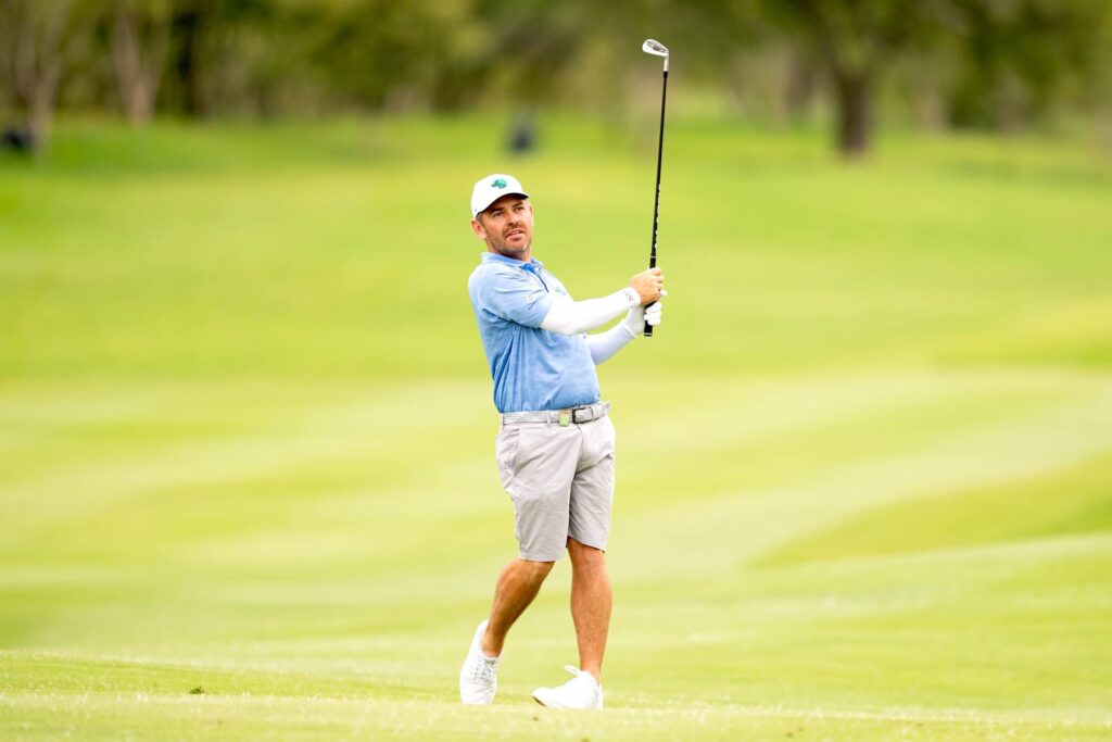 Captain Louis Oosthuizen of Southern Guards GC hits his shot on the second hole during the pro-am before the start of the LIV Golf South Africa at The Club at Steyn City