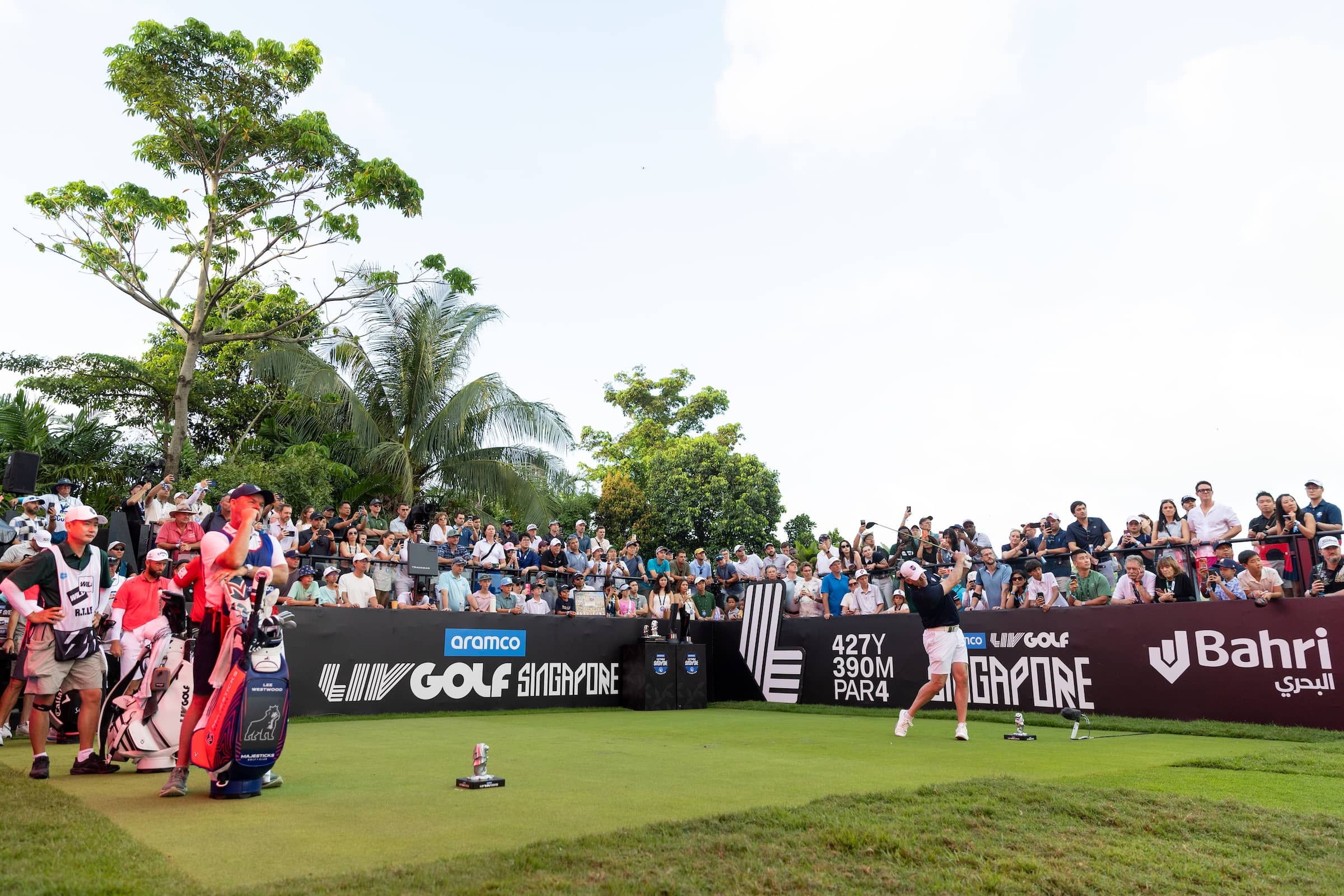 Co-Captain Lee Westwood of Majesticks Golf Club hits his shot from the first tee during the third round of Aramco LIV Golf Singapore