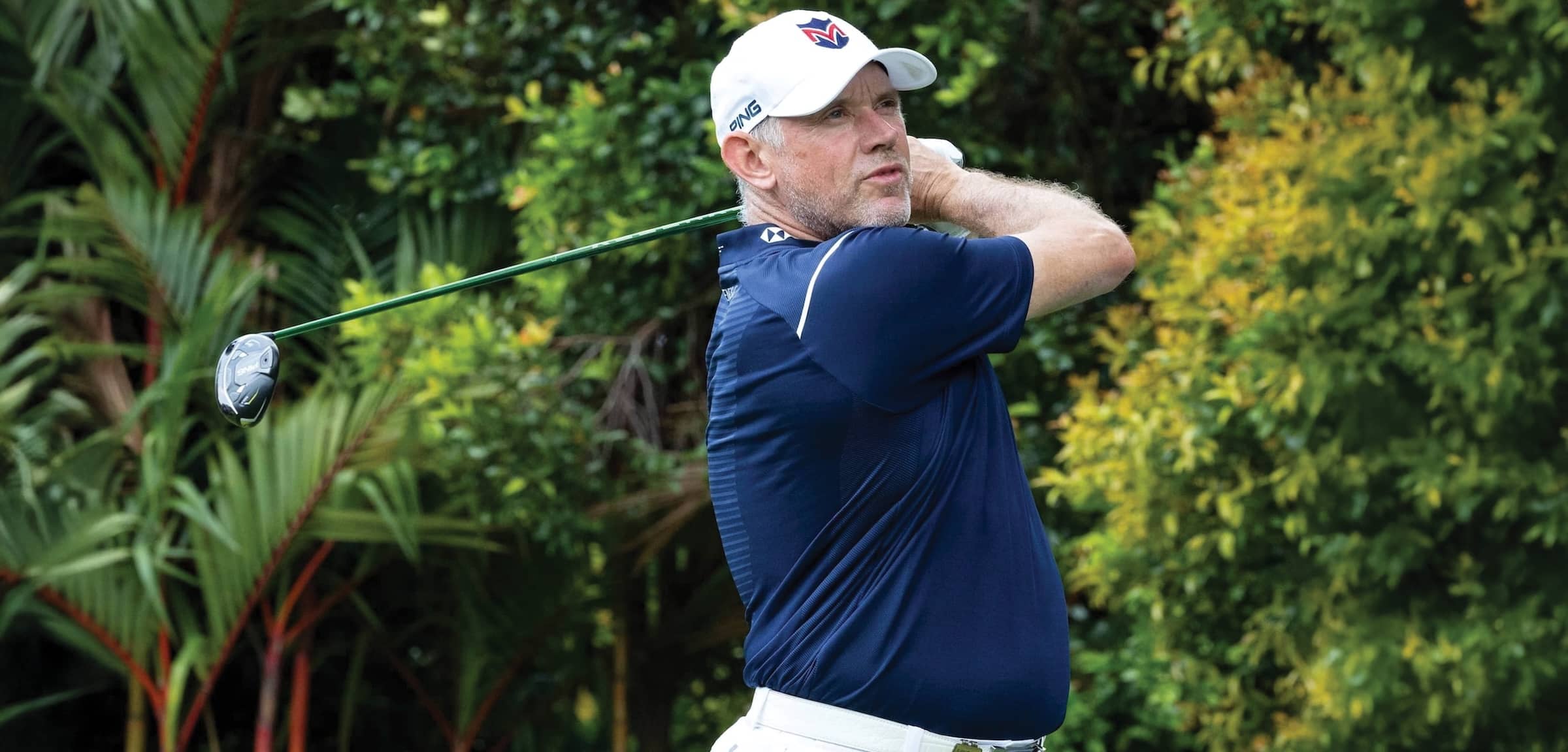Co-Captain Lee Westwood of Majesticks Golf Club hits his shot from the 10th tee during the first round