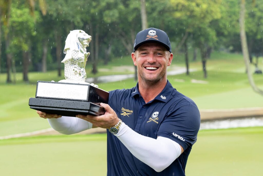 First place individual champion, Captain Bryson DeChambeau of Crushers GC poses for a photo with the trophy following the final round of Aramco LIV Golf Singapore