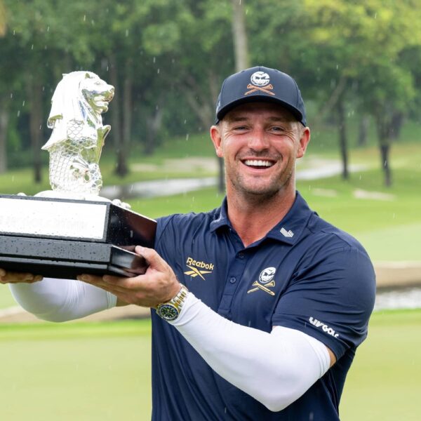 First place individual champion, Captain Bryson DeChambeau of Crushers GC poses for a photo with the trophy following the final round of Aramco LIV Golf Singapore