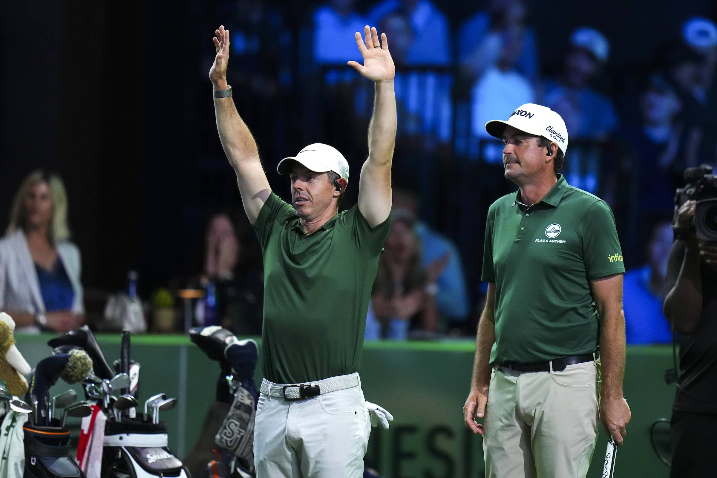 McIlroy trying to will Hideki_s ball into the hole 2