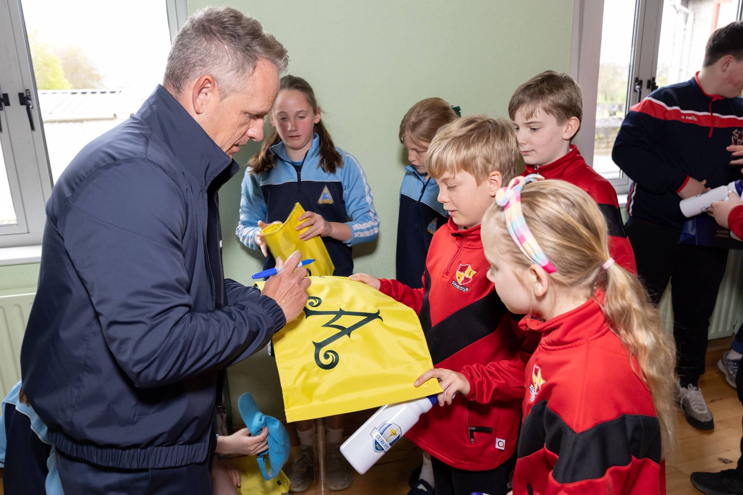 Luke Donald signs autographs for Limerick School Children