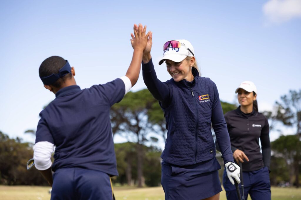Professionals from the Sunshine Ladies Tour and Ladies European Tour treated the young golfers of the Sally Little Golf Trust and Imibala Trust to a golf clinic at this week’s Investec South African Women’s Open at Royal Cape Golf Club.