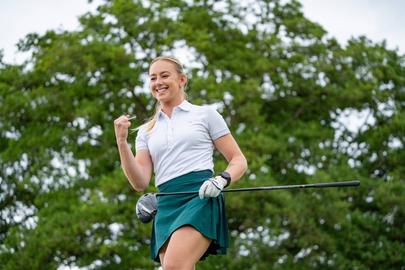 Woman Golfer wearing shotscope watch