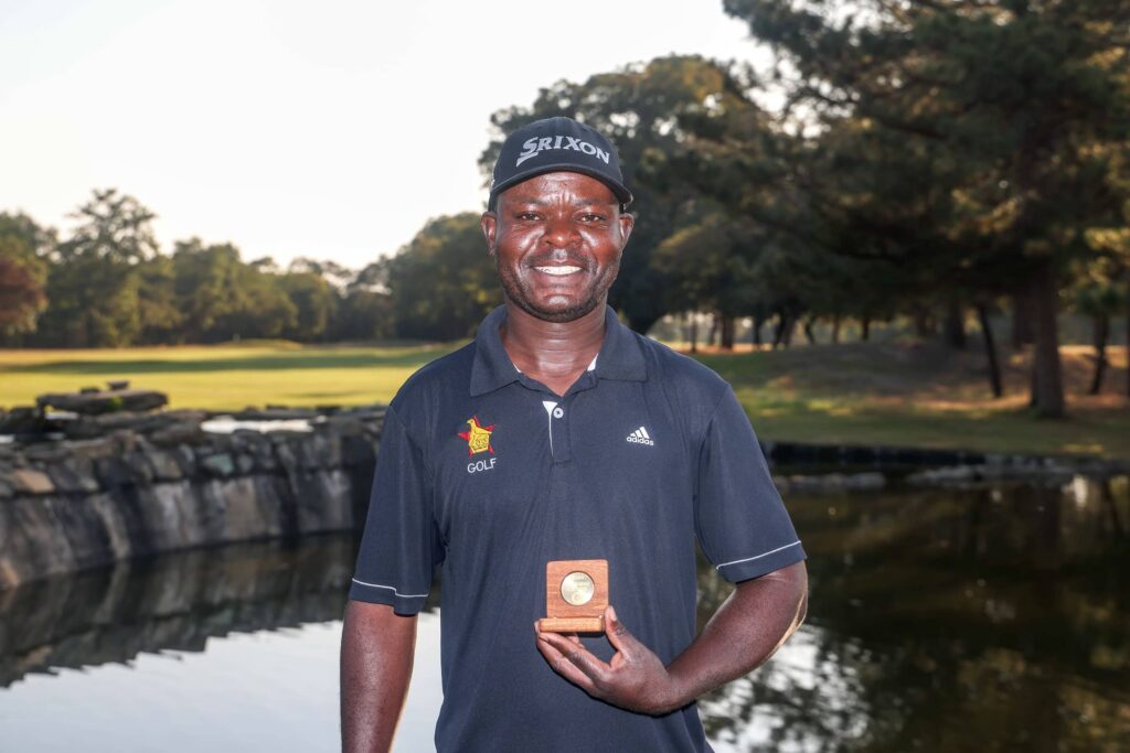 Andrew Bonongwe, winning caddie