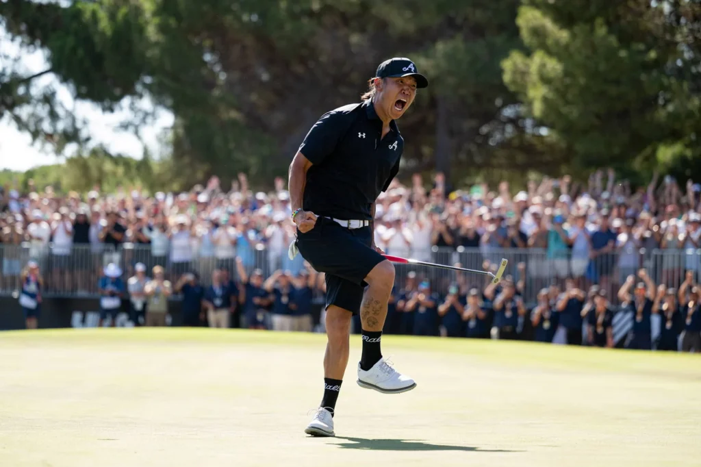 Anthony Kim of 4Aces GC celebrates on the 18th green