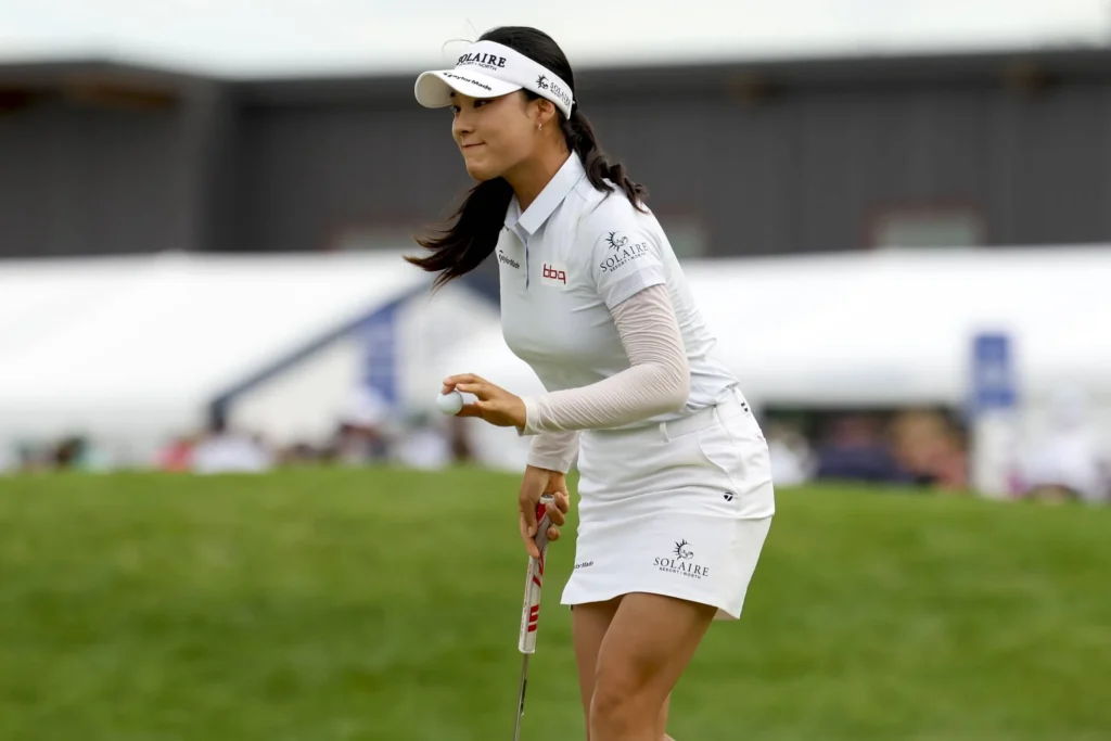 Ina Yoon reacts after making her putt on the 18th hole during the second round of the KPMG Women's PGA Championship at Hazeltine National Golf Club